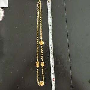 Gold chain and disk necklace